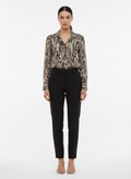 Camisa Manga Longa Estampa Zebra Preto e Creme - Canal/P